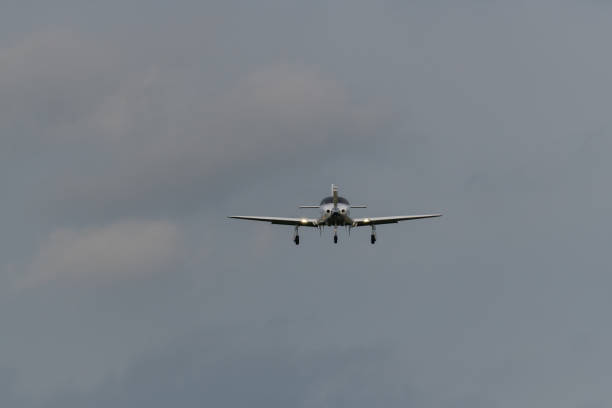 istock a landing  plane on a gray background 1168796747