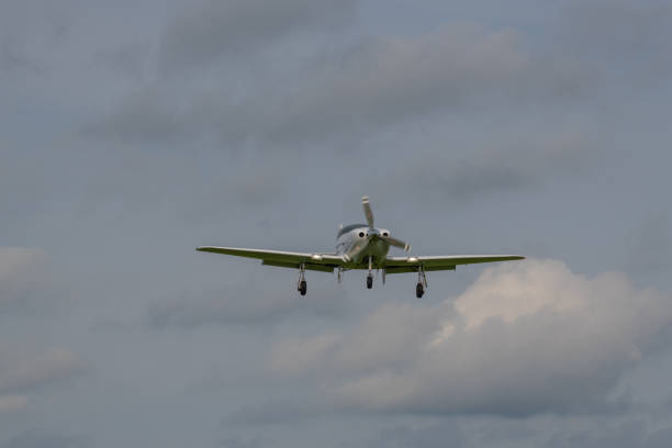 istock a landing  plane on a gray background 1168796815