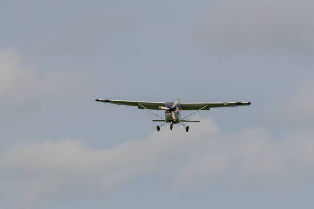 istock a landing  plane on a gray background 1168796816