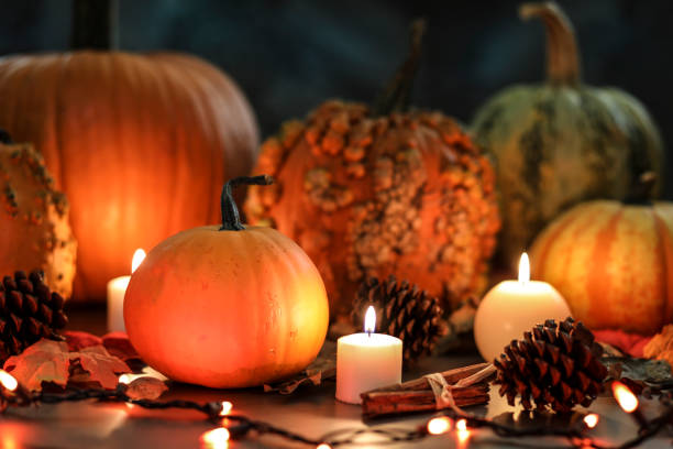 istock Halloween, autumn scene with pumpkins and candles. 1168797015