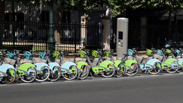 Paris, France. January 17. 2021. Row Electric-assisted bicycle, ecological alternative against pollution. Ecological urban transport.