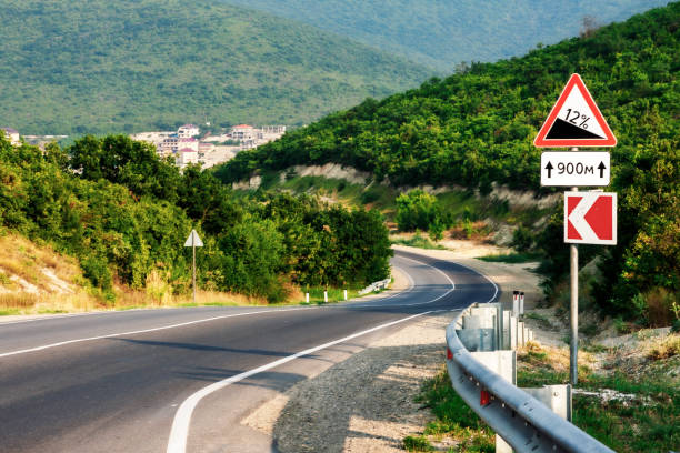istock Road signs mounted on a mountain road. 1168802055