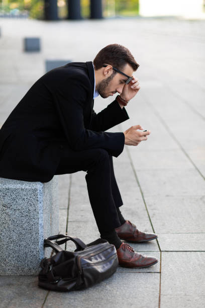 istock Modern young man playing on phone, browsing mobile news. Gadget Dependence 1168805812