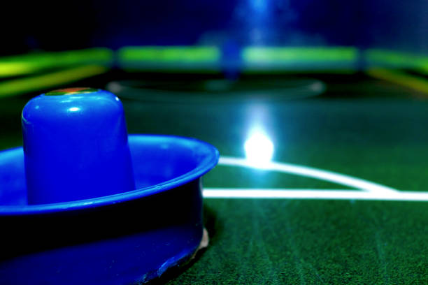 istock Bright and brilliant air hockey table with instruments for playing. 1168806508