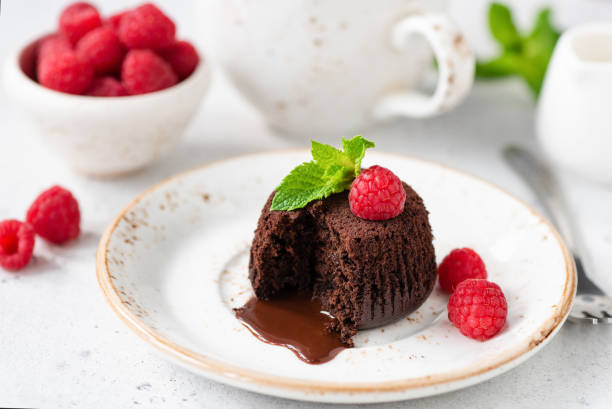 istock Chocolate lava cake with molten core on white plate 1168808016