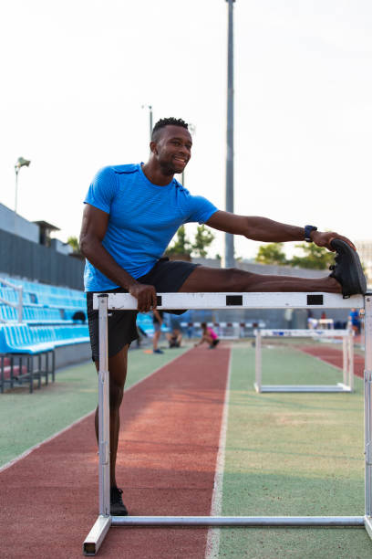 istock Athlete Man Preparing And Runs Hurdles for Track and Field 1168809103