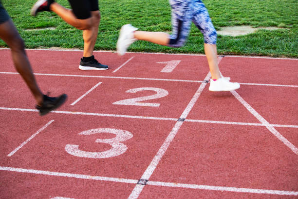 istock Athletes Crossing the Finish Line 1168809122