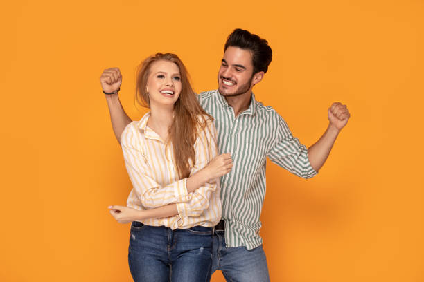 istock Beautiful couple smiling, posing together. 1168810597