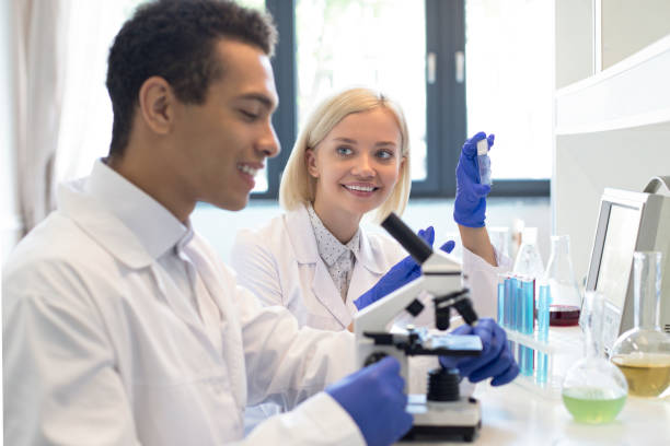istock Man and woman working in lab 1168810643