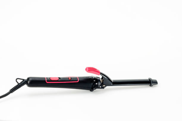 istock Hair iron on white mat background with copy space 1168810982