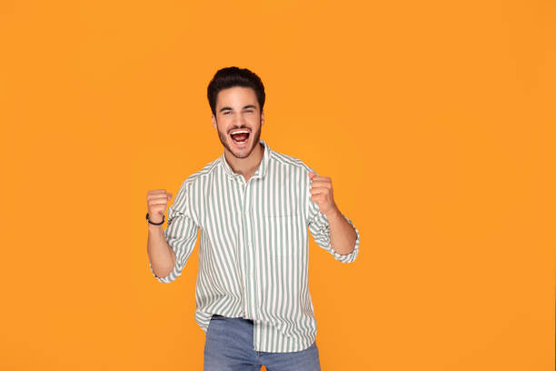 istock Happy handsome man smiling to the camera. 1168814507
