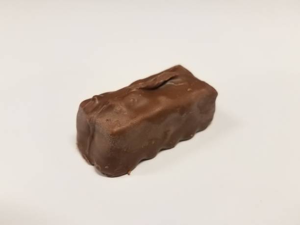 istock brown chocolate bar snack on white surface or desk 1168818799