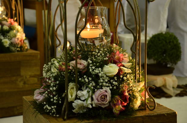 istock Candles and flowers 1168822232
