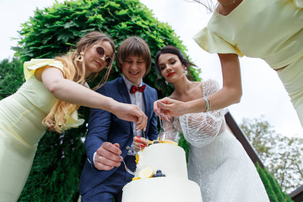 istock Newlyweds and bridesmaids have fun 1168824464