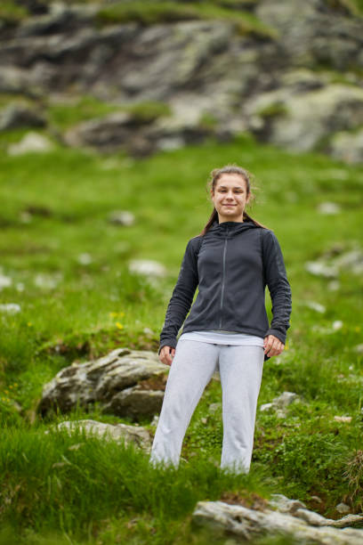 istock Woman hiker with backpack 1168827927