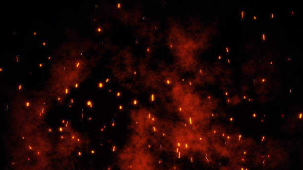istock Burning glowing red hot sparks, embers fly from large fire in the night sky 1168832448