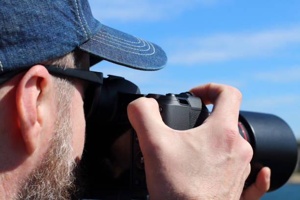 istock A man taking a photo 1168834060