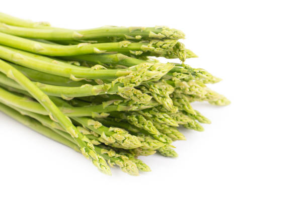 istock Fresh green asparagus isolated on white background 1168837078