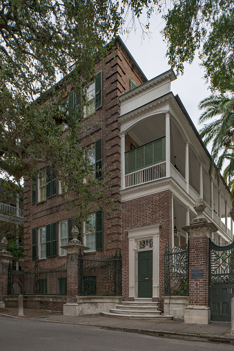 Charleston, SC, USA - August 5, 2019: Colonial brick house Charleston SC USA
