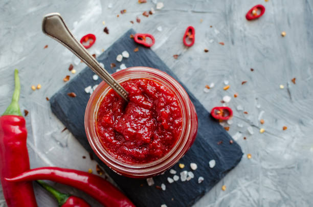 istock Red hot chili jam with fresh ingredients 1168839804