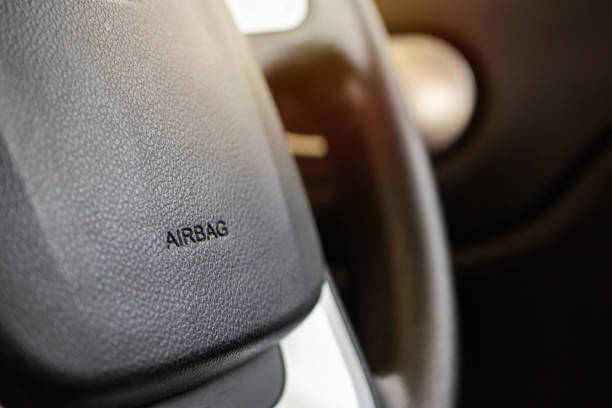 istock Safety airbag sign on car steering wheel 1168840005