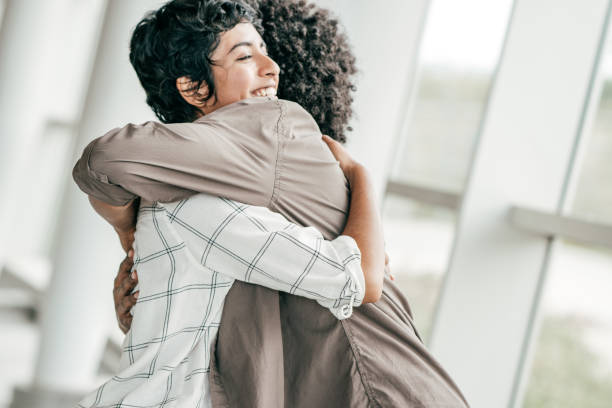 The Healing Power Of Hugs Stock Photo - Download Image Now - Adult
