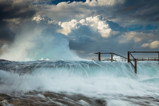 Storm waves hitting Curl Curl Tidal Pool, Sydney, Australia