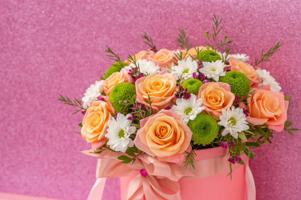 istock Beautiful flower bouquet, isolated on pink background 1168842574