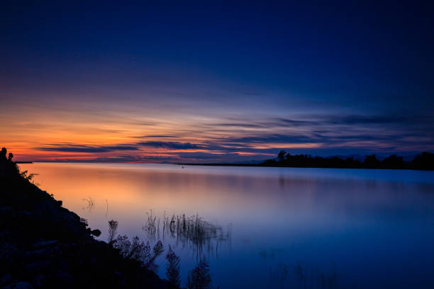 istock sunset glow view at the estuary where river meets sea 1168842582