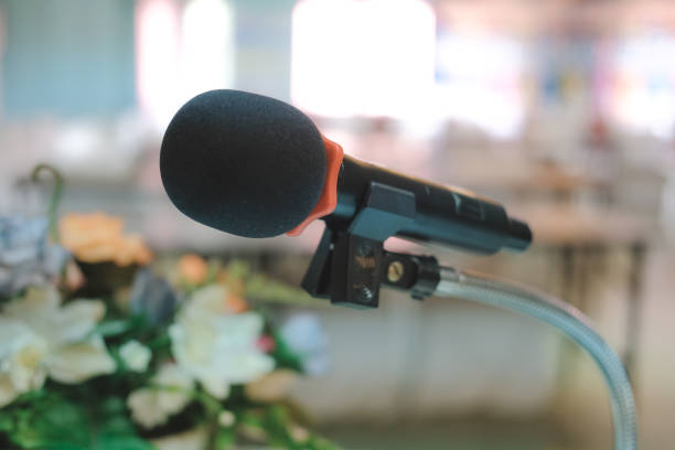istock microphone in conference hall interior. seminar room with empty seat. business event 1168842615