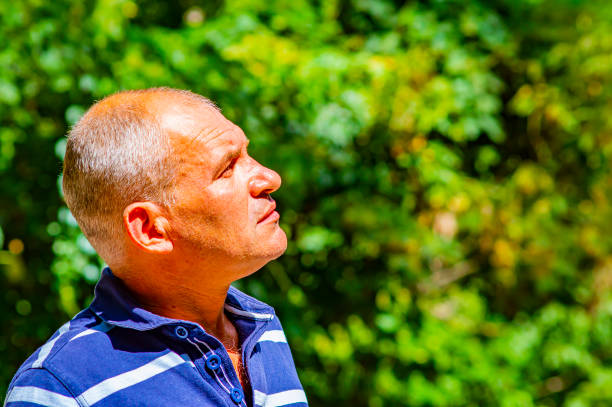 istock Portrait of a gray-haired middle-aged man. 1168848951