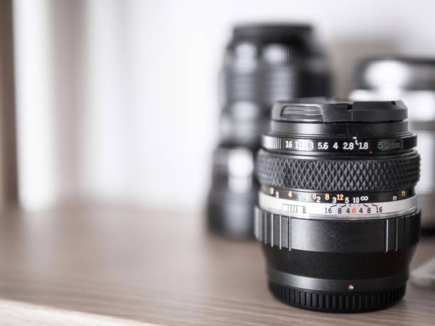 istock Selective focus of vintage camera lens. 1168850123