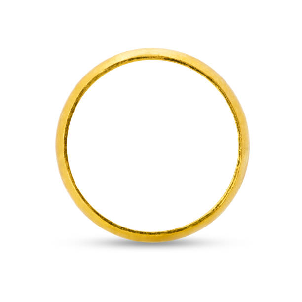 istock Closeup of gold ring for wedding isolated on white background. 1168856594