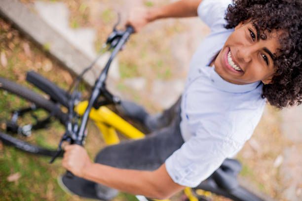 istock Young man moving to work by bicycle 1168869573