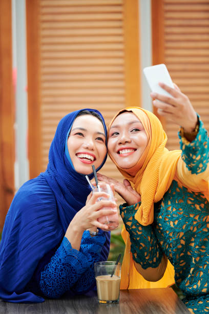 istock Muslim women posing for selfie 1168869834
