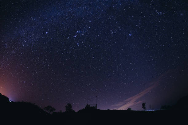 istock Landscape night sky stars milky way on mountains background 1168872596