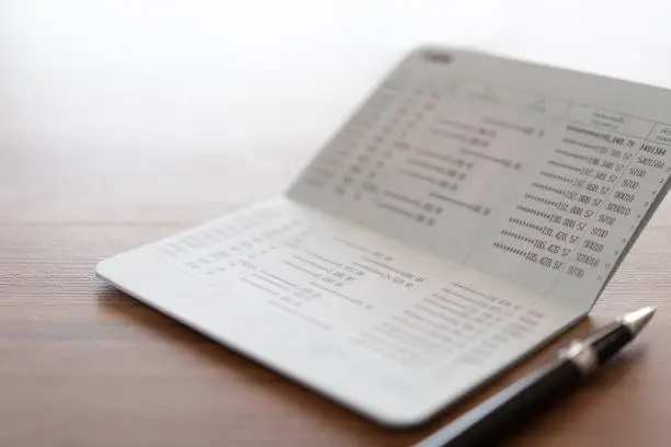 bank account passbook on desk.