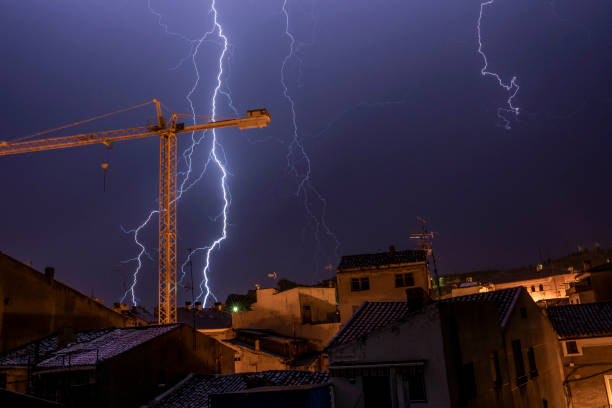 istock Panoramic view of an old village during a storm with lightnings and thunders - Image 1168885423