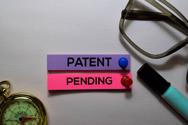 istock Patent Pending text on sticky notes isolated on office desk 1168887100