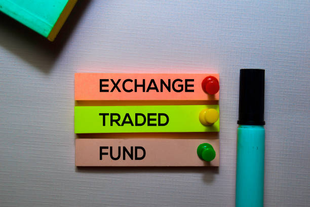istock Exchange Traded Fund (ETF) text on sticky notes isolated on office desk 1168887480