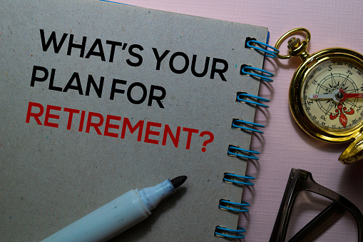 What's Your Plan For Retirement? text on the book isolated on office desk