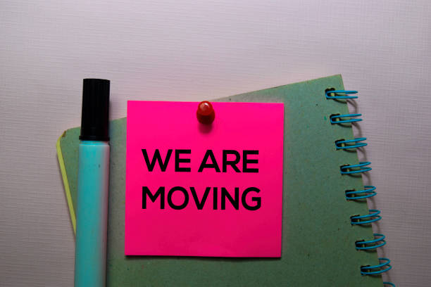 istock We Are Moving text on sticky notes isolated on office desk 1168888145