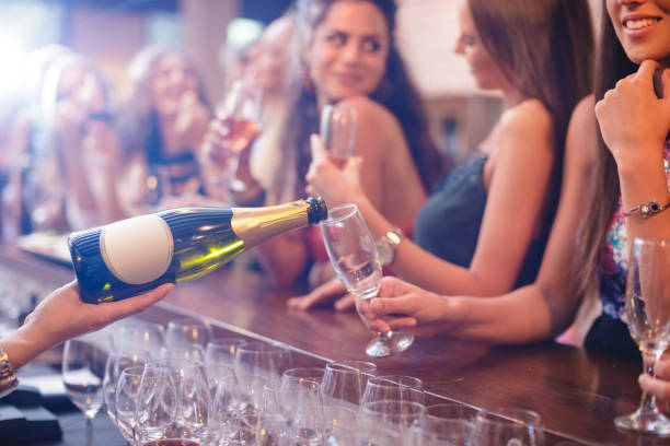 istock Holding champagne flute and waiting to be served with wine 1168888526