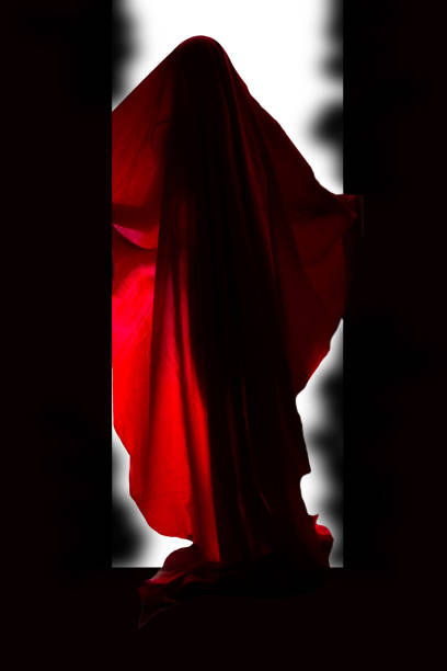 istock Scary person in red dress 1168889184