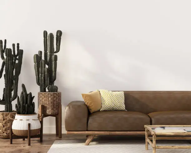 Boho-style interior with stylish leather sofa, rattan table and wicker pots with cacti / 3D illustration, 3d render