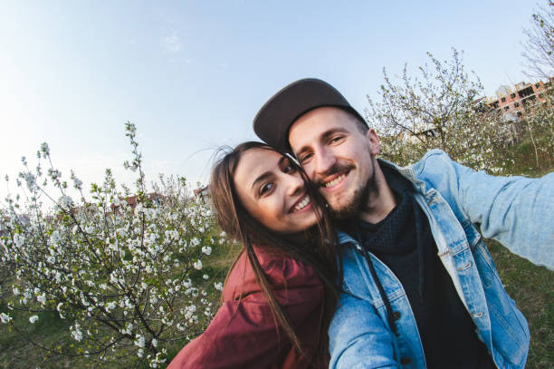 istock Selfie in orchard in blossom 1168893900