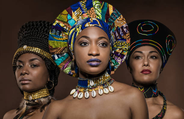 istock Three Beautiful Black Women wearing african headdresses 1168896008