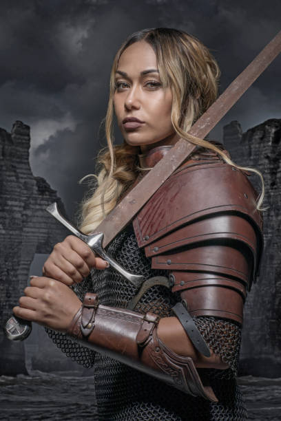 istock Beautiful black Sword wielding viking warrior female 1168896895