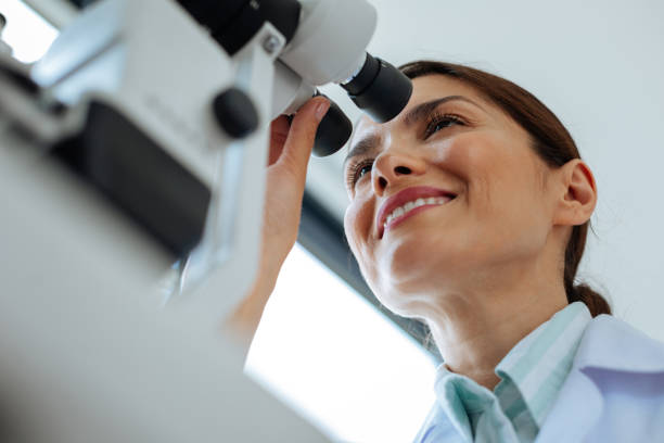 istock Low angle of a delighted smiling woman 1168896930