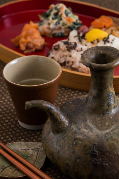 istock Sake lees and glass for shochu liquor 1168896954